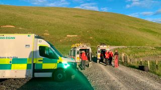 Tweed Valley Mountain Rescue Team attending to an injured mountain biker