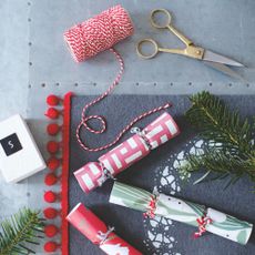 christmas crackers with string and scissors