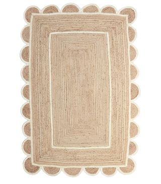 jute rug with scallop edge detail and white lines