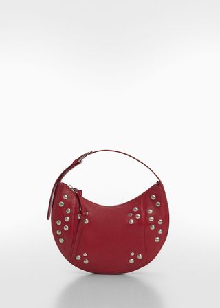 red studded handbag