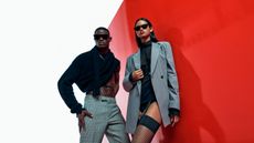 Two People wearing clothing from Yoox and sunglasses.