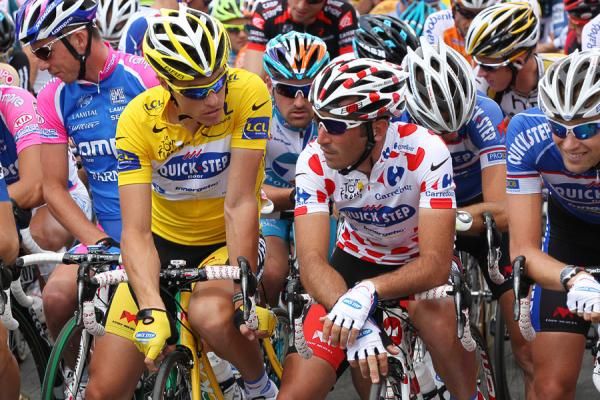 Quick Step teammates Sylvanin Chavanel and Jerome Pineau hold yellow and the polka-dot jerseys respectively.