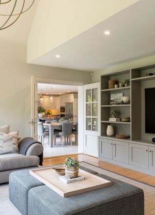 home cinema with wooden floor and grey entertainment unit