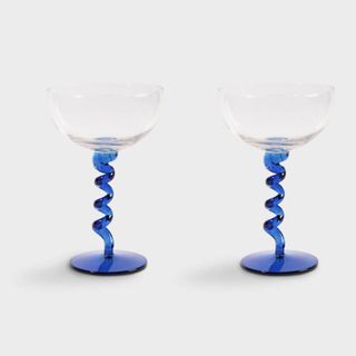Two wine glasses with swirly blue stems