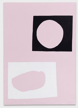 A pink rectangle with black and white geometric shapes on top
