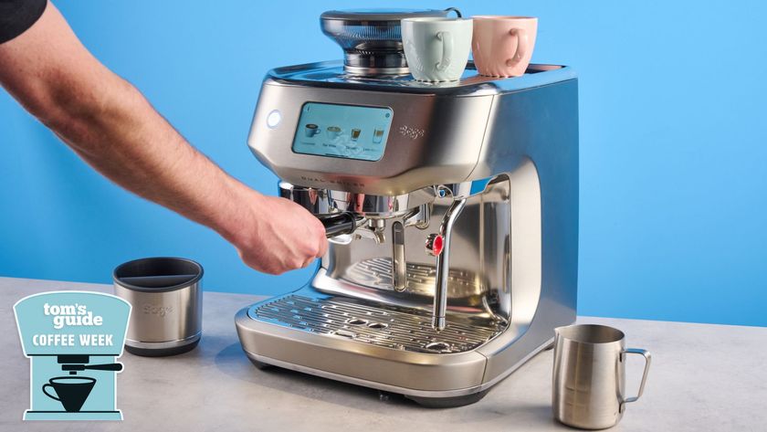 Tom&#039;s Guide Coffee Week logo over an espresso machine on a blue background