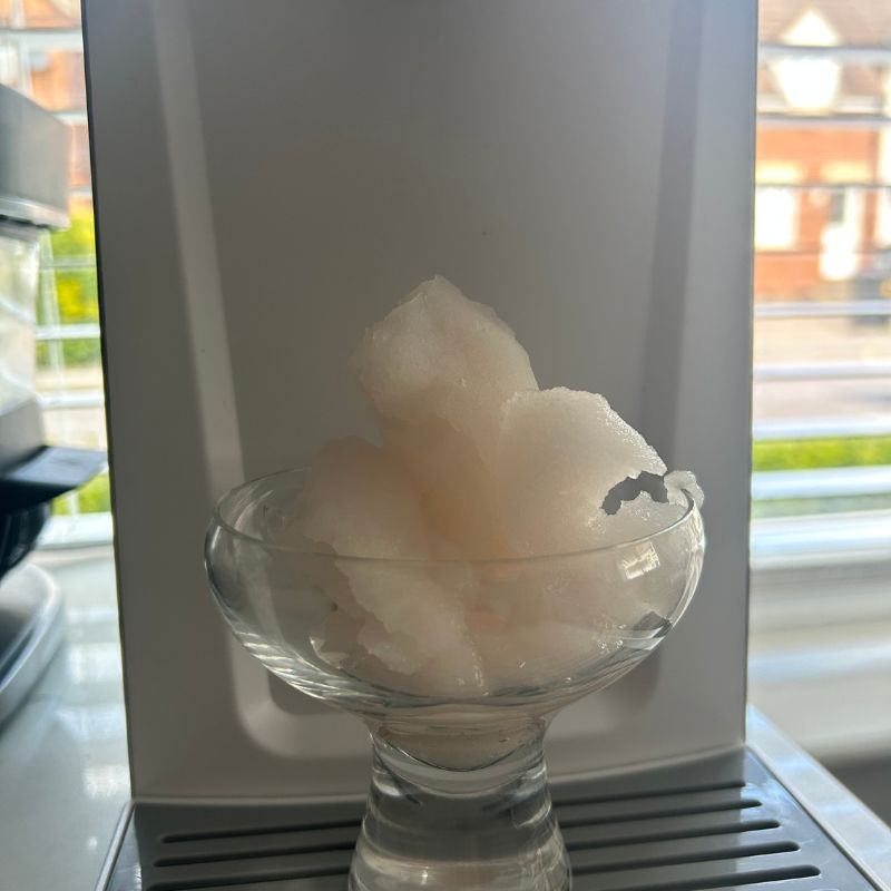 Pink lemonade slushy in glass