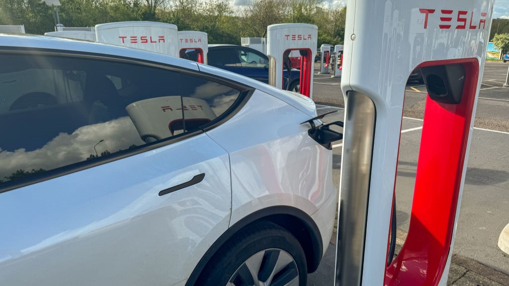 Supercharger charging stations for Tesla electric vehicles is seen at a service station.