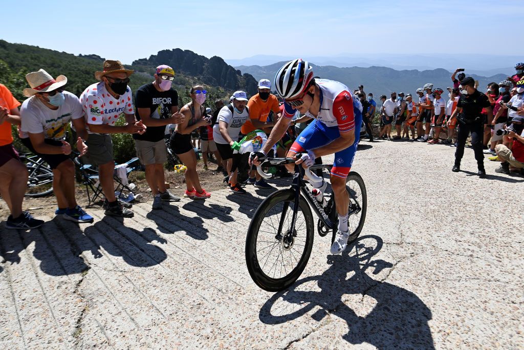 PICO VILLUERCAS SPAIN AUGUST 28 Arnaud Demare of France and Team Groupama FDJ climbs the Alto Collado de Ballesteros 1415m while fans cheer during the 76th Tour of Spain 2021 Stage 14 a 1657km stage from Don Benito to Pico Villuercas 1580m lavuelta LaVuelta21 on August 28 2021 in Pico Villuercas Spain Photo by Stuart FranklinGetty Images