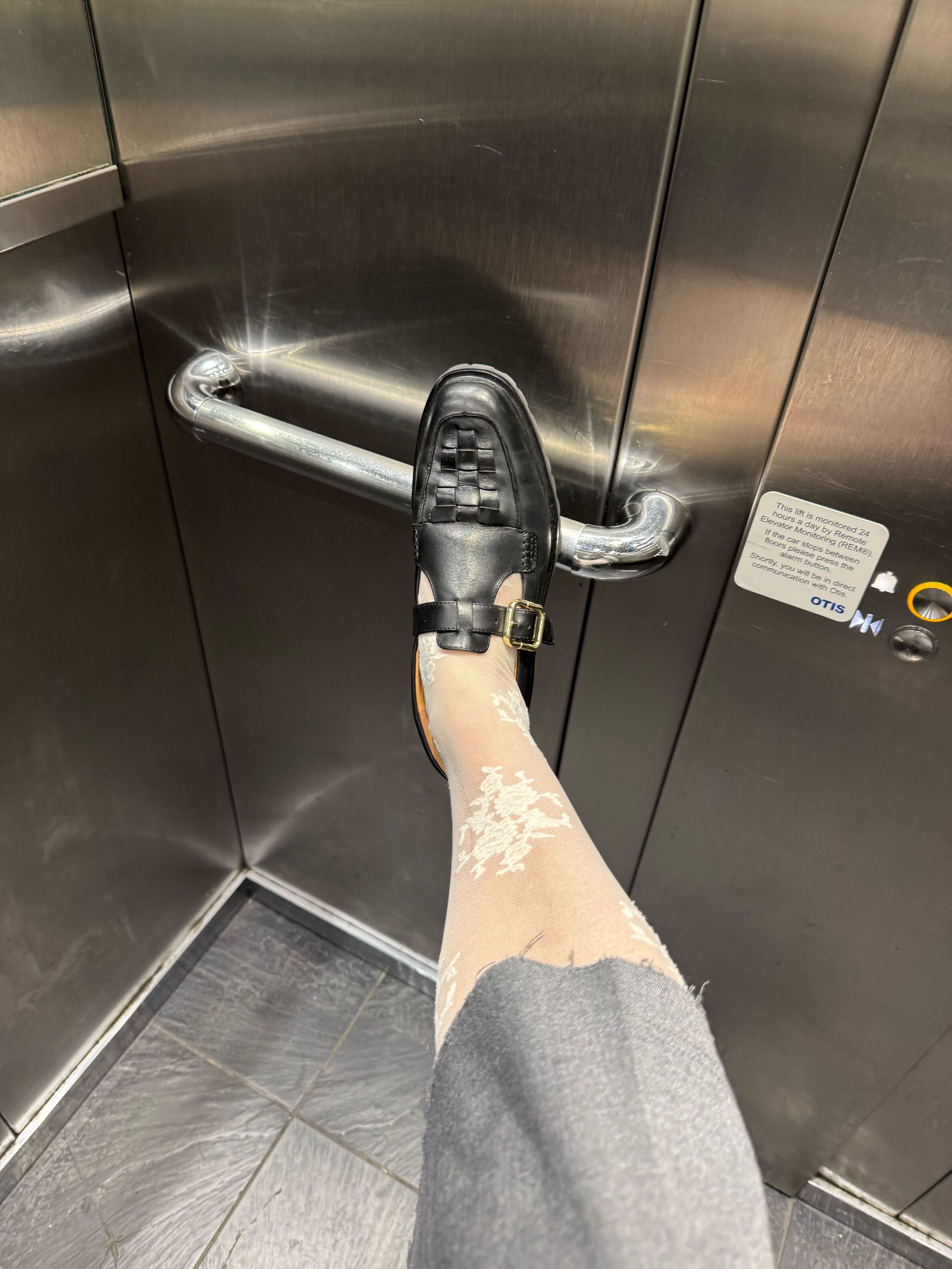 Fashion editor Rebecca Rhys evens wears a London spring capsule wardrobe 2026 piece. She wears monk shoes.