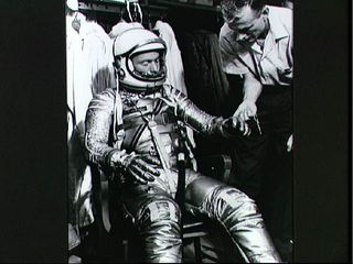 Astronaut Scott Carpenter and Technician Joe Schmidt During Suiting Exercise