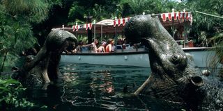 Disneyland visitors ride one of the Jungle Cruise boats.