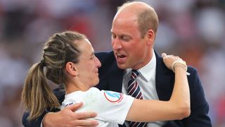 Prince William, Duke of Cambridge, congratulates Jill Scott during the UEFA Women's Euro England 2022 final match