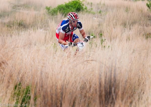 Todd Wells (Specialized) leading through the tall grass on Armstrong