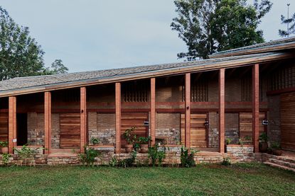 Kampala art centre front facade with timber columns, a piece of sustainable architecture