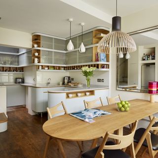kitchen with cabinets and dining table