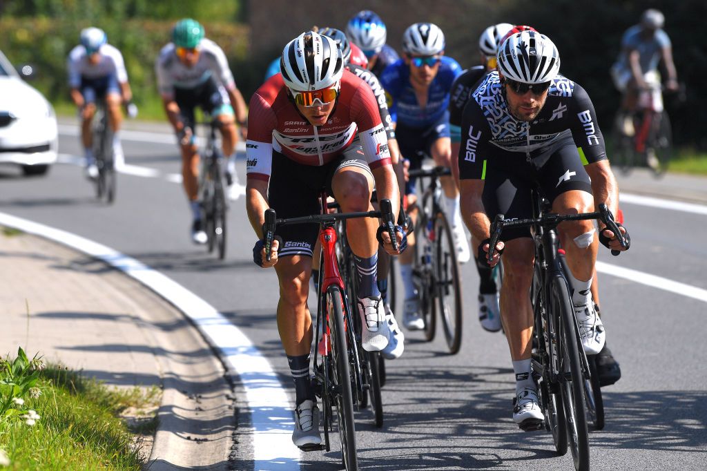 GERAARDSBERGEN BELGIUM SEPTEMBER 05 LR Toms Skujins of Latvia and Team Trek Segafredo and Reinardt Janse Van Rensburg of South Africa and Team Qhubeka Nexthash compete in the breakaway during the 17th Benelux Tour 2021 Stage 7 a 1809km stage from Namur to Geraardsbergen BeneluxTour on September 05 2021 in Geraardsbergen Belgium Photo by Luc ClaessenGetty Images