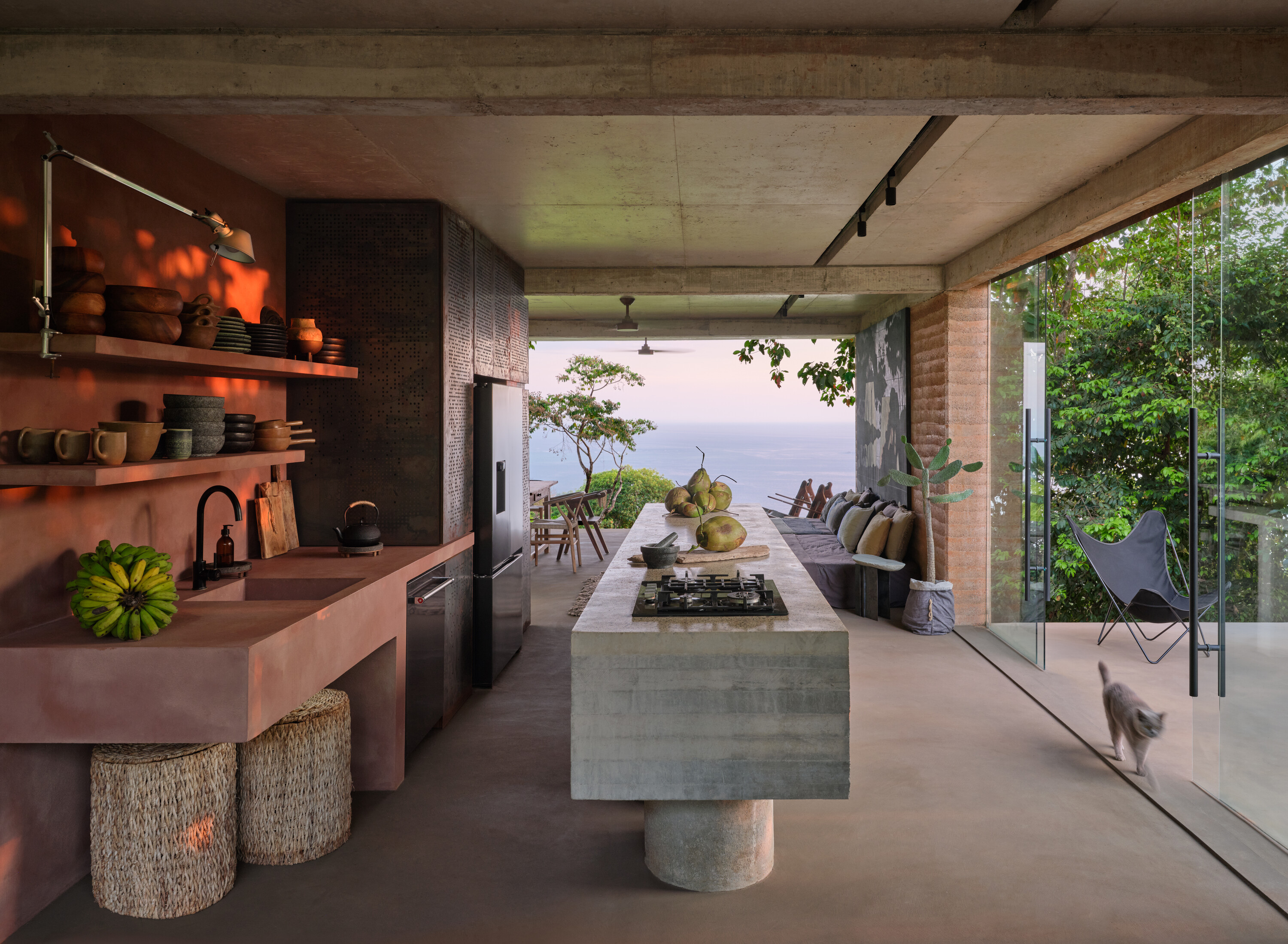 The entrance terrace (at right) leads into the main living space