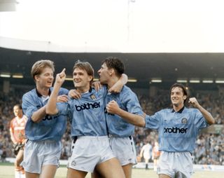 Manchester City celebrate their fifth goal in a 5-1 win over Manchester United in 1989