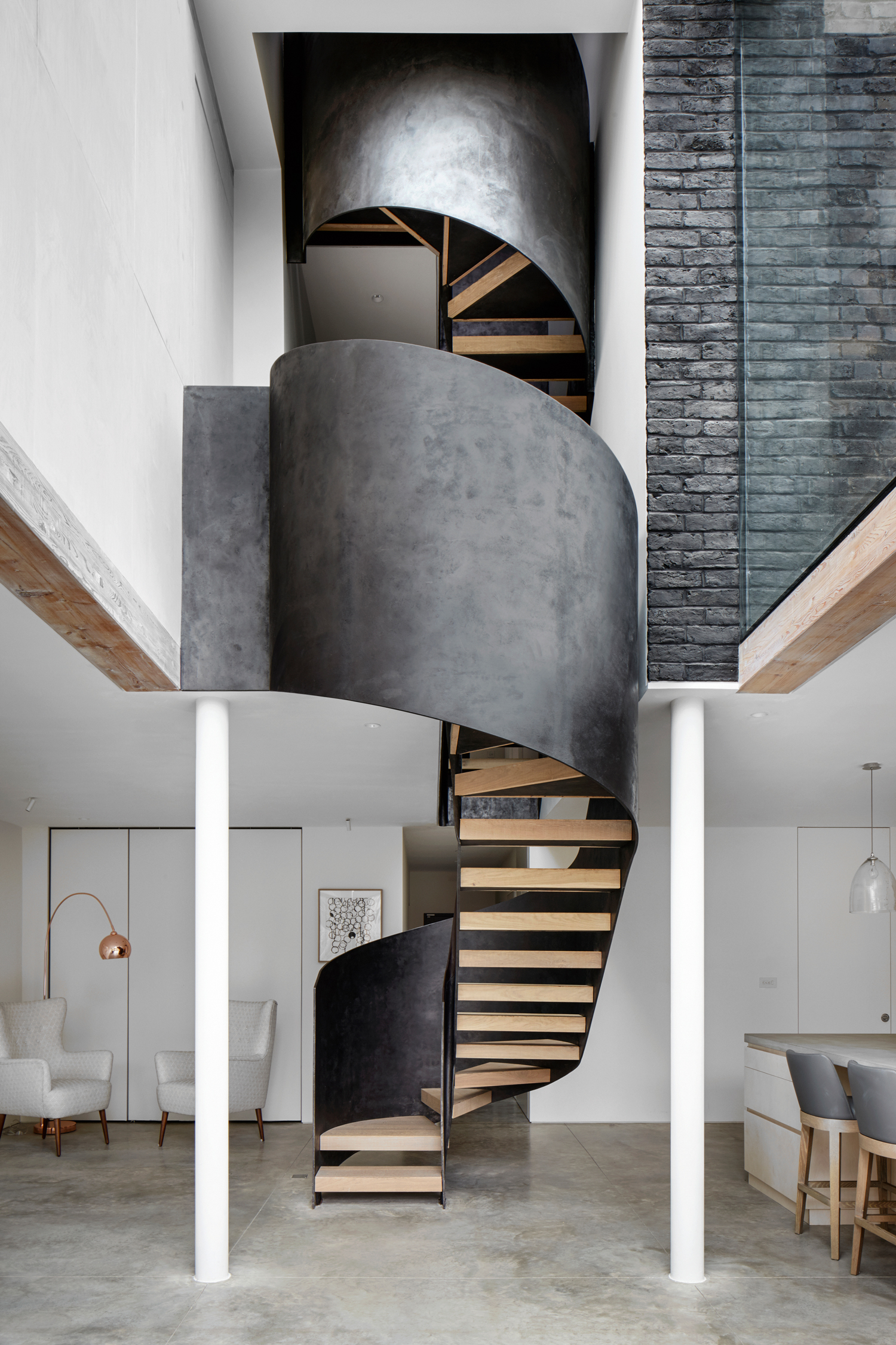 staircase ideas with dramatic steel spiral staircase