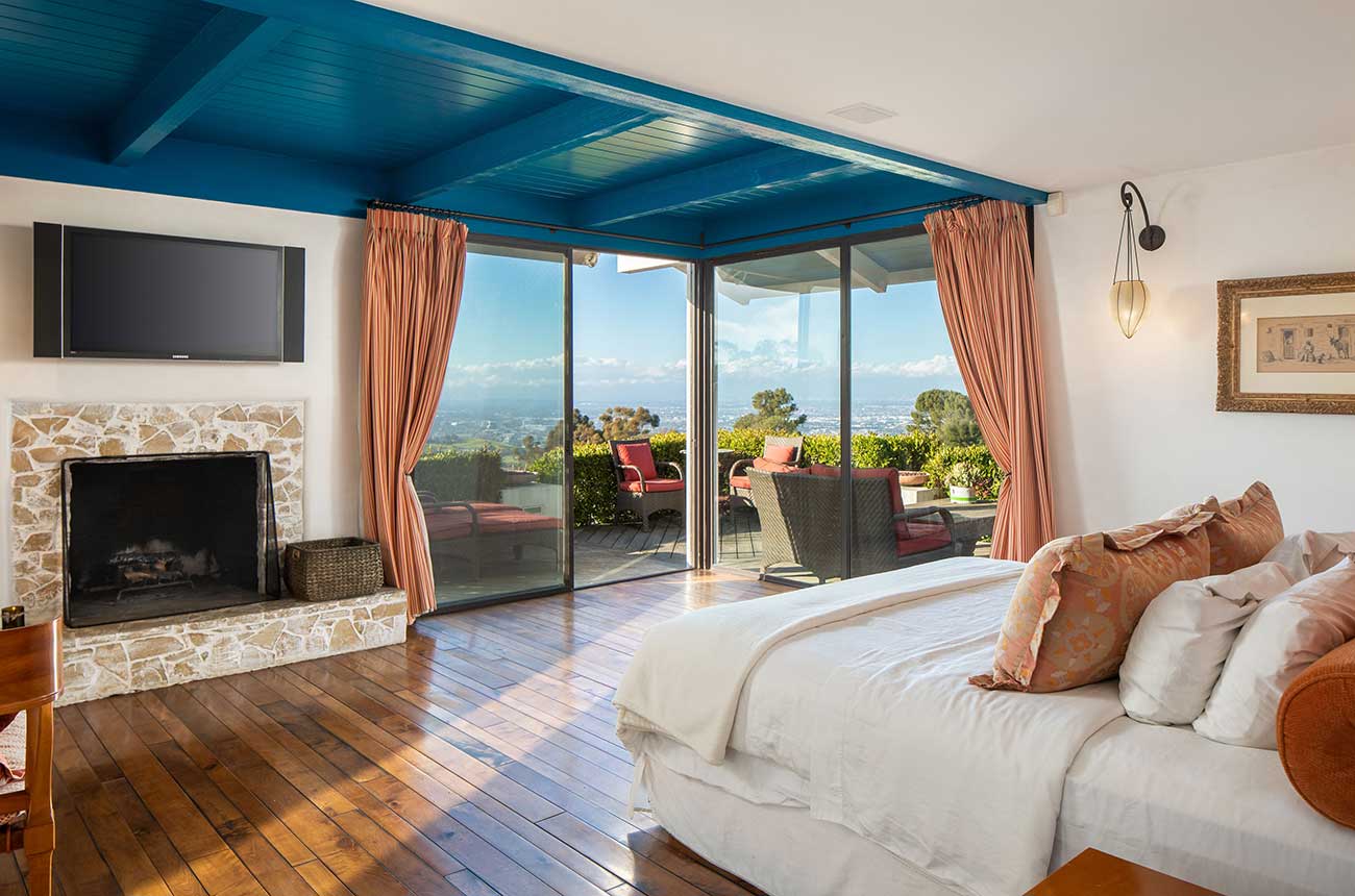 Views across the landscape from a villa listed in LA by Sotheby's International Realty.