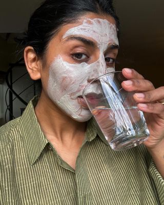 Monikh wearing a creamy face mask