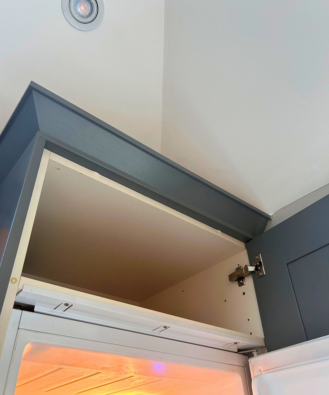 Cleared space above fridge