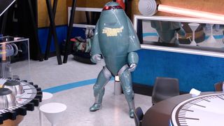 Zingbot next to the time traveler table. 