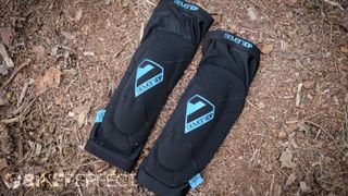 Two 7 Protection Sam Hill Knee Pads side by side