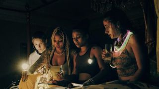 Bee, Sophie, Jordan and Alice during a power outage in Bodies Bodies Bodies