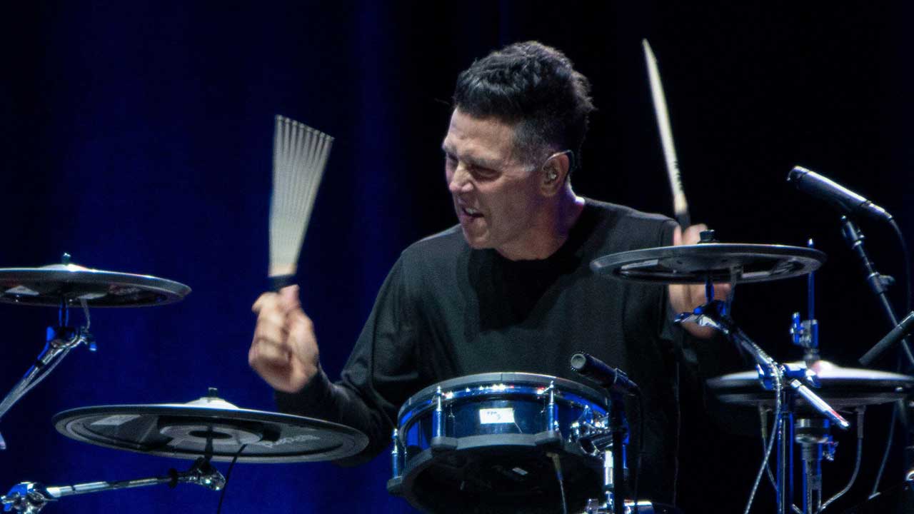 Scott Devours onstage
