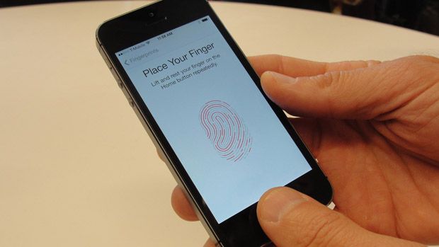 New iPhone 5S handsets let people use their fingerprints to unlock the smartphones at an iPhone event at Apple&amp;#039;s headquarters in Silicon Valley on September 10, 2013 in Cupertino, California.