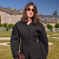 Jeanne Damas wearing a black blazer in Paris