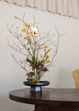 Ikebana arrangement in a lamp
