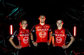 Three Arkéa-B&B Hotels riders in their 2025 kit, with a red jersey and black arms