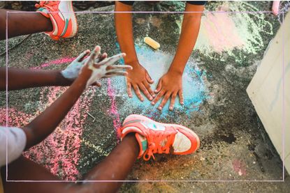 Sensory Play illustrated by kids playing with chalk