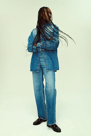 Denim shirt outfit on a model.