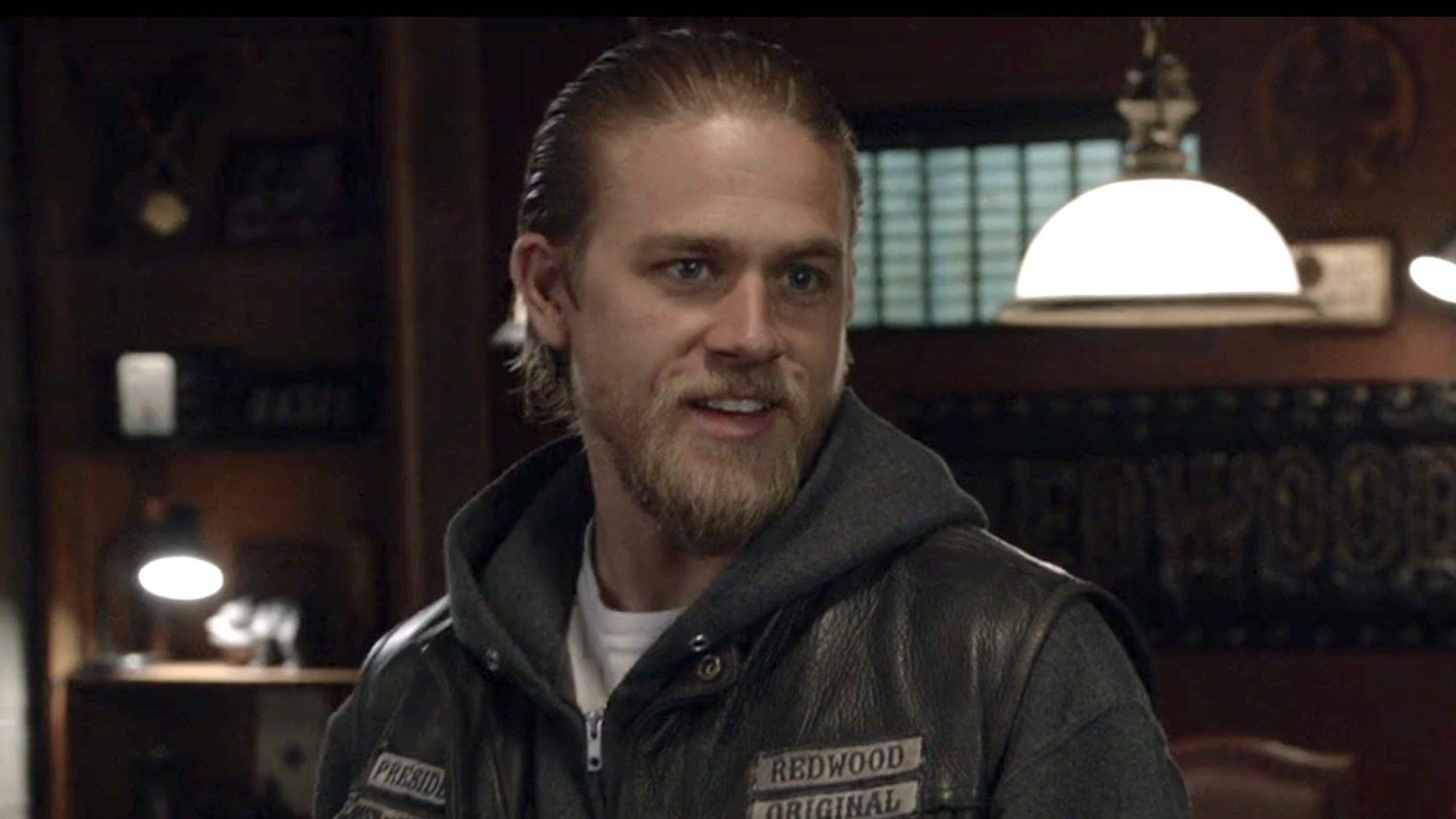 Jax smiling maliciously at Bobby in Sons of Anarchy