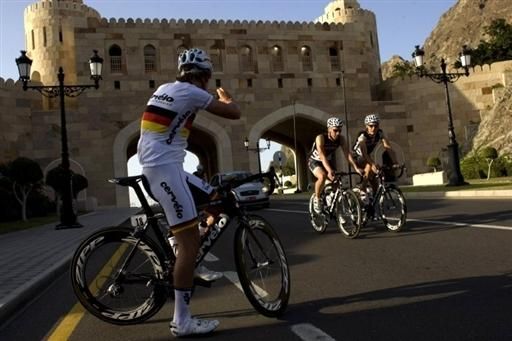 German champion Martin Reimer takes a photograph of his teammates in Oman