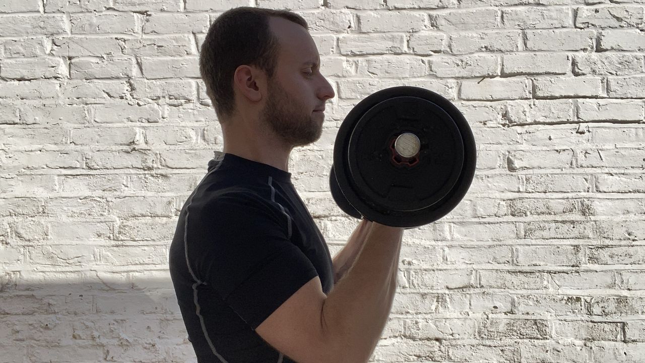 Man doing a dumbbell workout