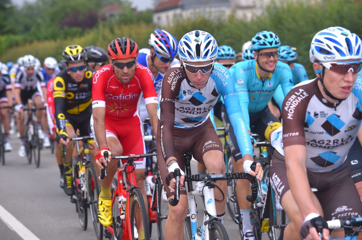 Romain Bardet riding in the peloton pre-crash on stage 2