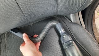 Using the Clean H20 extension hose to clean the car seats