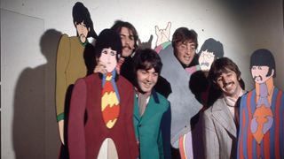 The Beatles posed with cardboard cutouts of their 'Yellow Submarine' characters at TVC animation Studios in London, 6th November 1967, L-R George Harrison, Paul McCartney, John Lennon, Ringo Starr. They were taking part in a short film called 'A Mod Odyssey' about the making of 'Yellow Submarine'