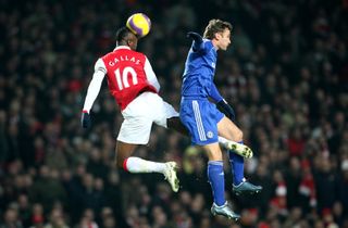 Arsenal's William Gallas jumps to win a header against Chelsea's Andriy Shevchenko in January 2008.