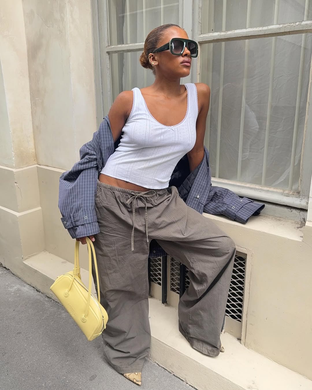 woman wearing neutral color pointed toe shoe trend 2025