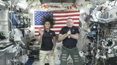 Astronauts Suni Williams, left, and Butch Wilmore give a news conference aboard the International Space Station