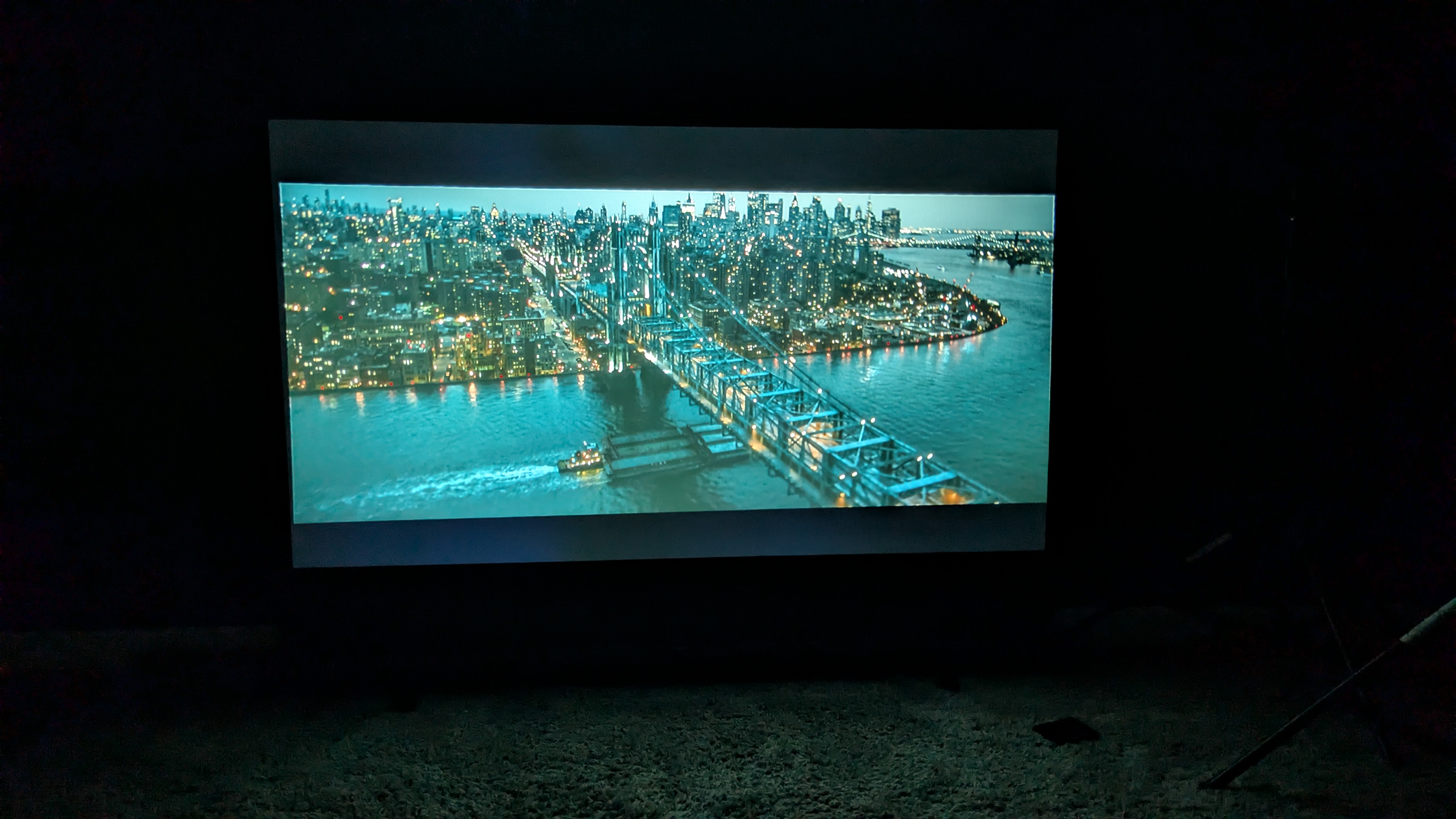 Yaber K3 displaying The Batman shot of Gotham on screen