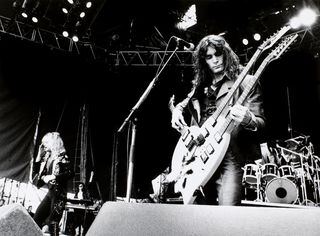 Steve Vai performing on stage with David Lee Roth, M O R, Tilburg, Netherlands, 9th April 1988.