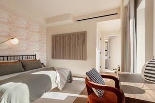 Interior of model apartment bedroom by Jean Lin