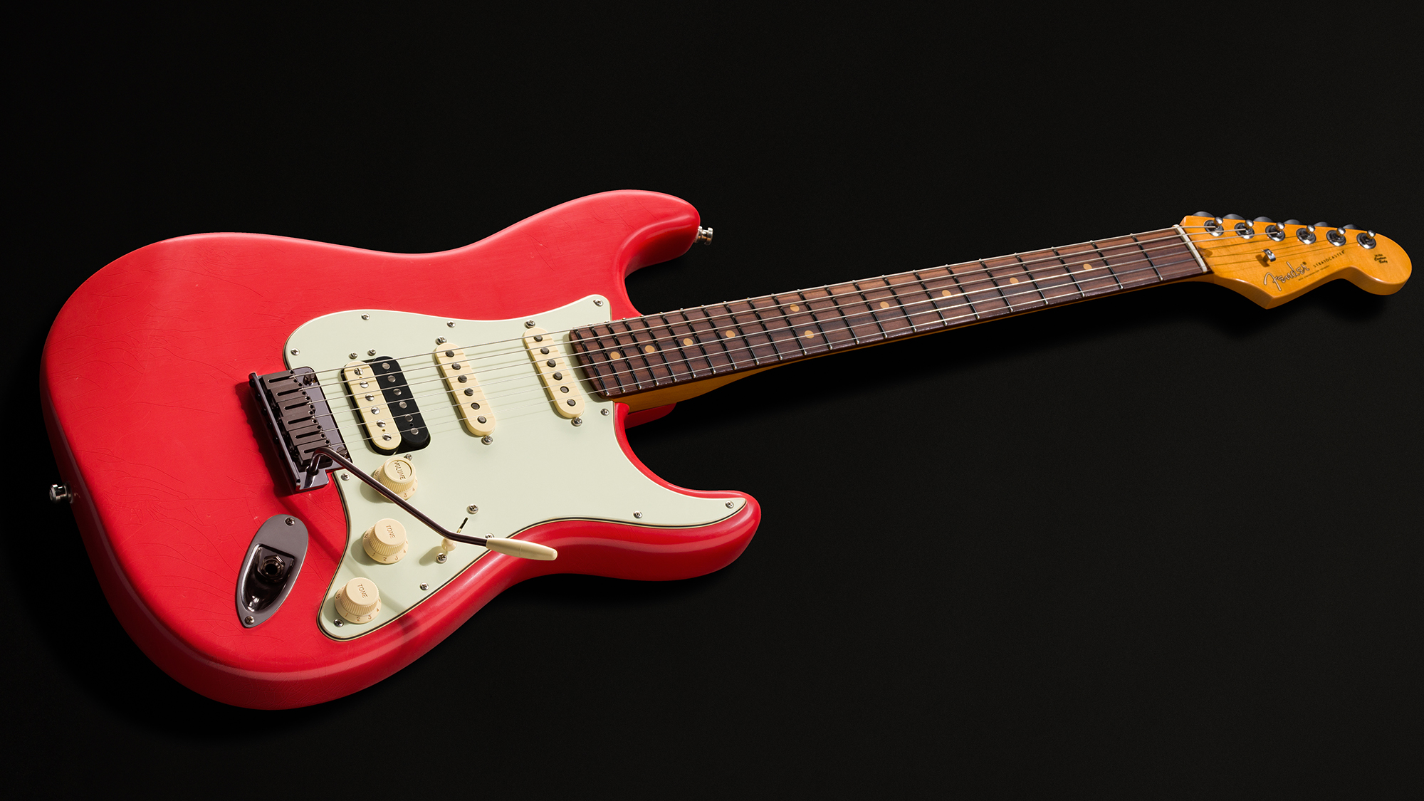 A photo of the Fender American Ultra Luxe Vintage &amp;rsquo;60s Stratocaster HSS in Fiesta Red